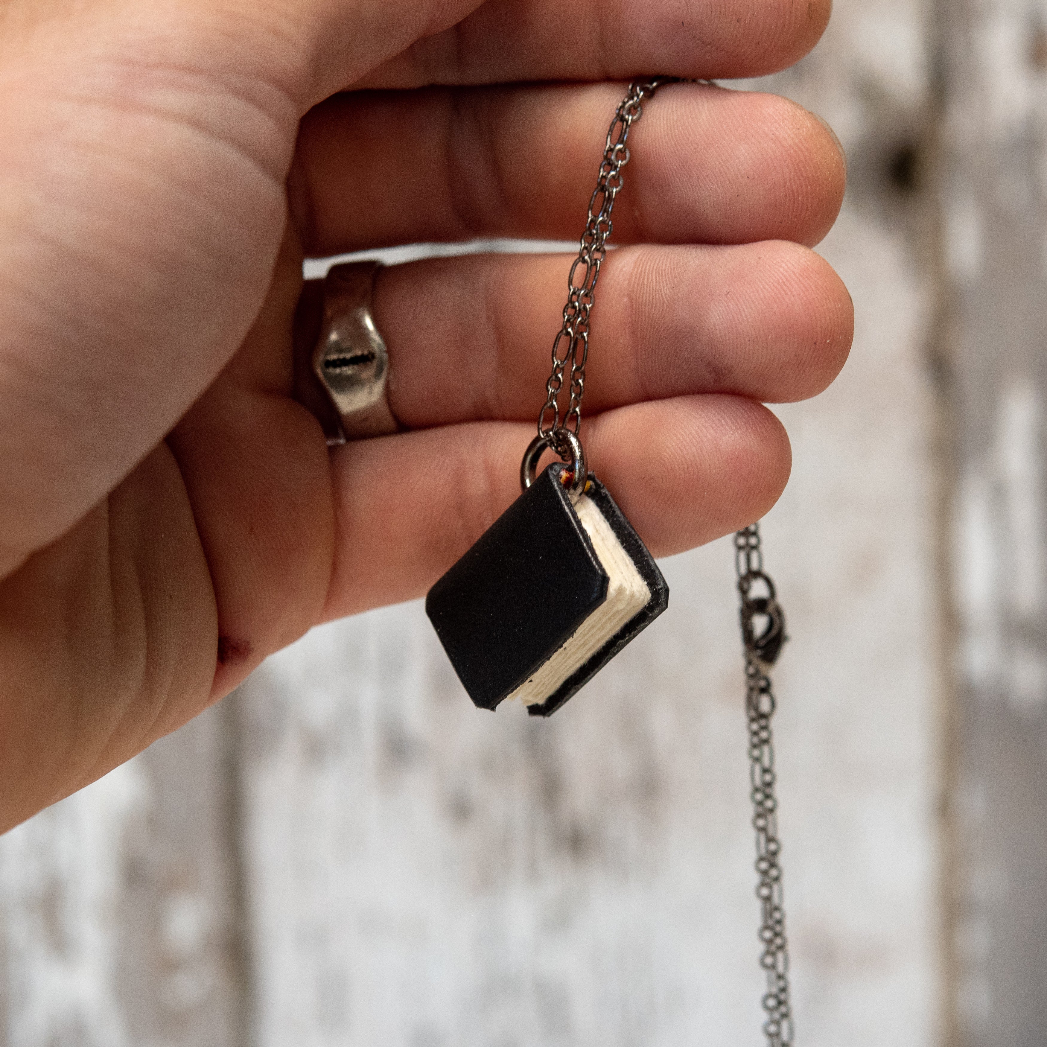 The Jackson Book Necklace (black)
