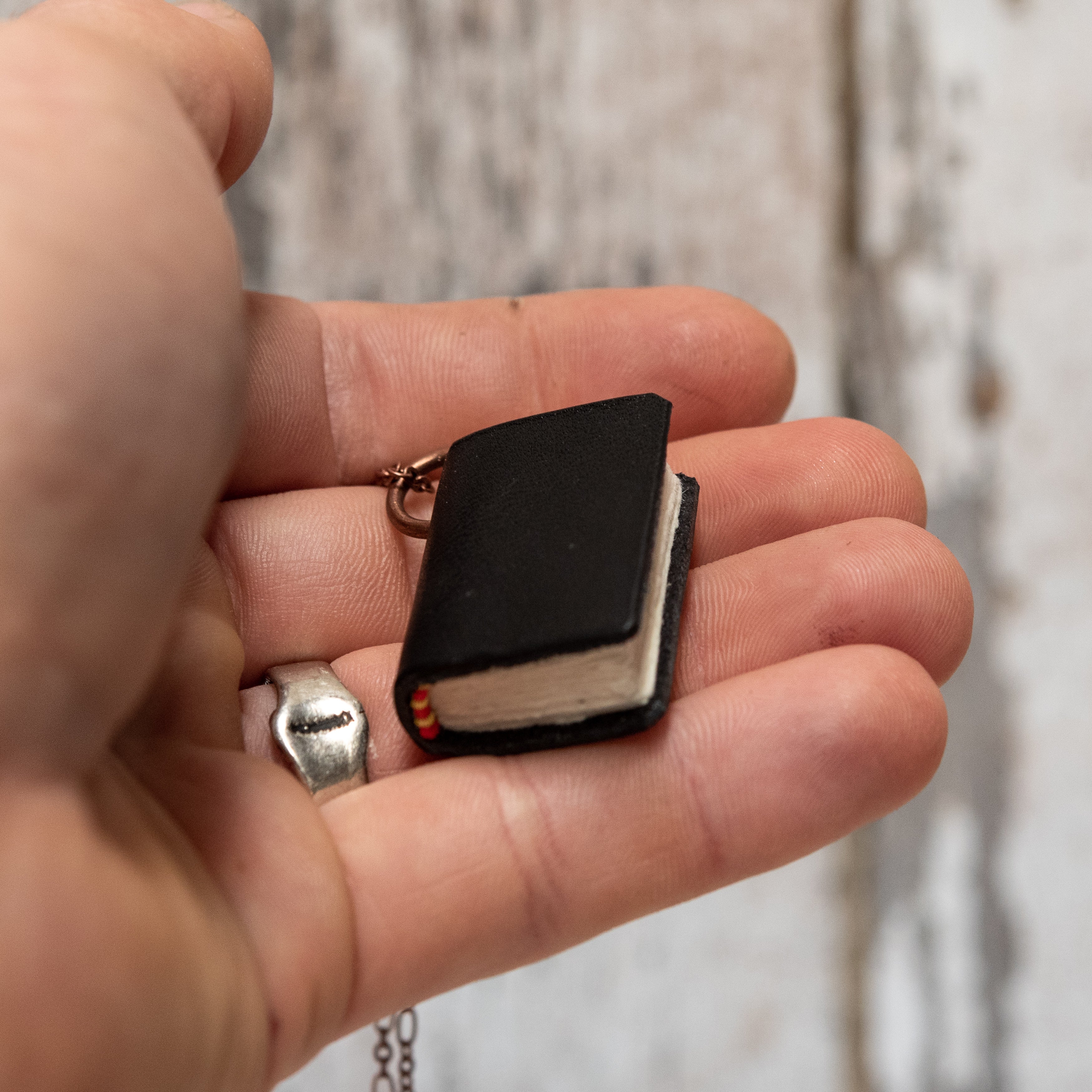 The Jackson Book Necklace (black)